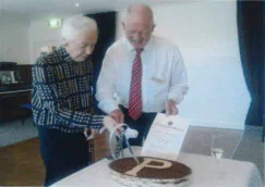 Janet Harrison-Ford and Ted Sheedy cut the birthday cake at our 25th Anniversary luncheon.